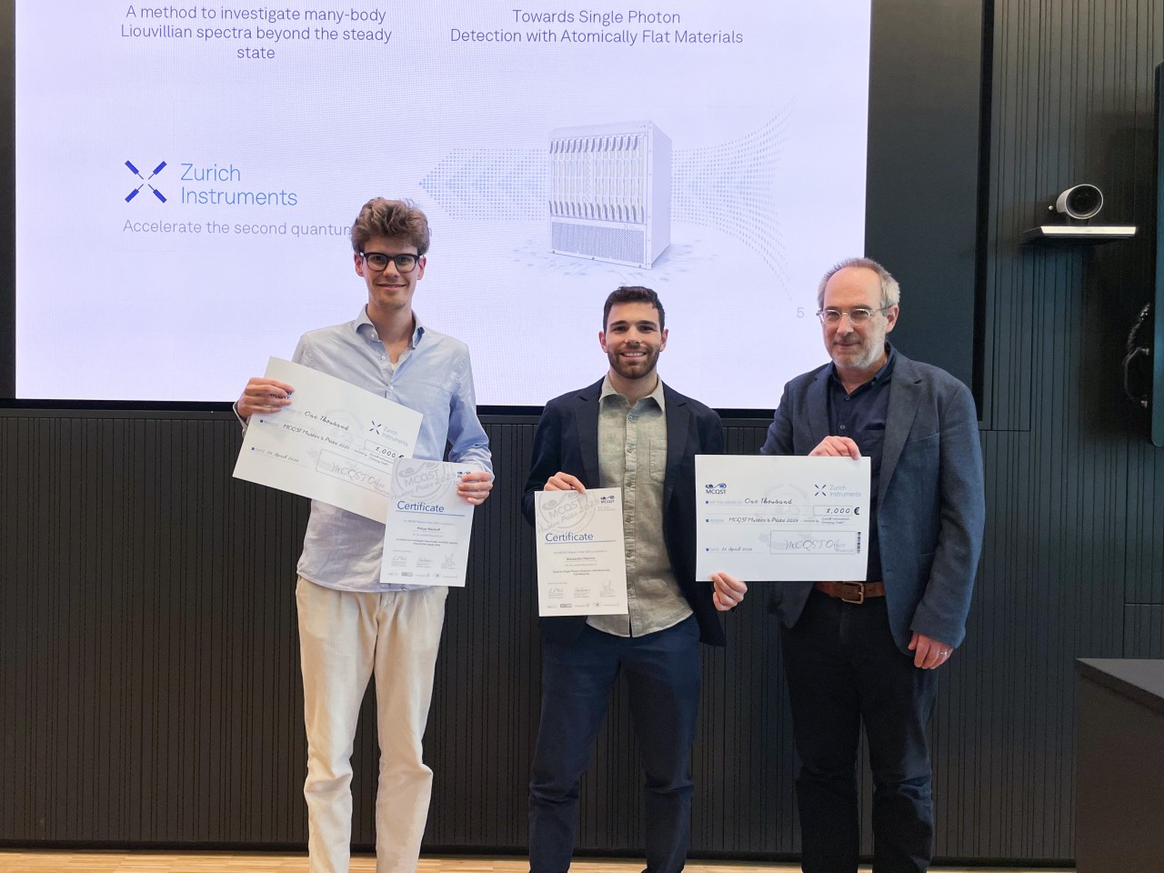Philipp Westhoff and Alessandro Palermo at the Awards Ceremony, alongside MAster in QST co-coordinator Jan von Delft. 